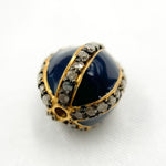 Load image into Gallery viewer, A round enamel bead with a black rhodium base and gold plating, encrusted with diamonds.