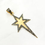 Load image into Gallery viewer, A set of three star-shaped diamond pendants in different finishes: one with black rhodium, one gold-plated, and one rose gold-plated, displayed against a white background.
