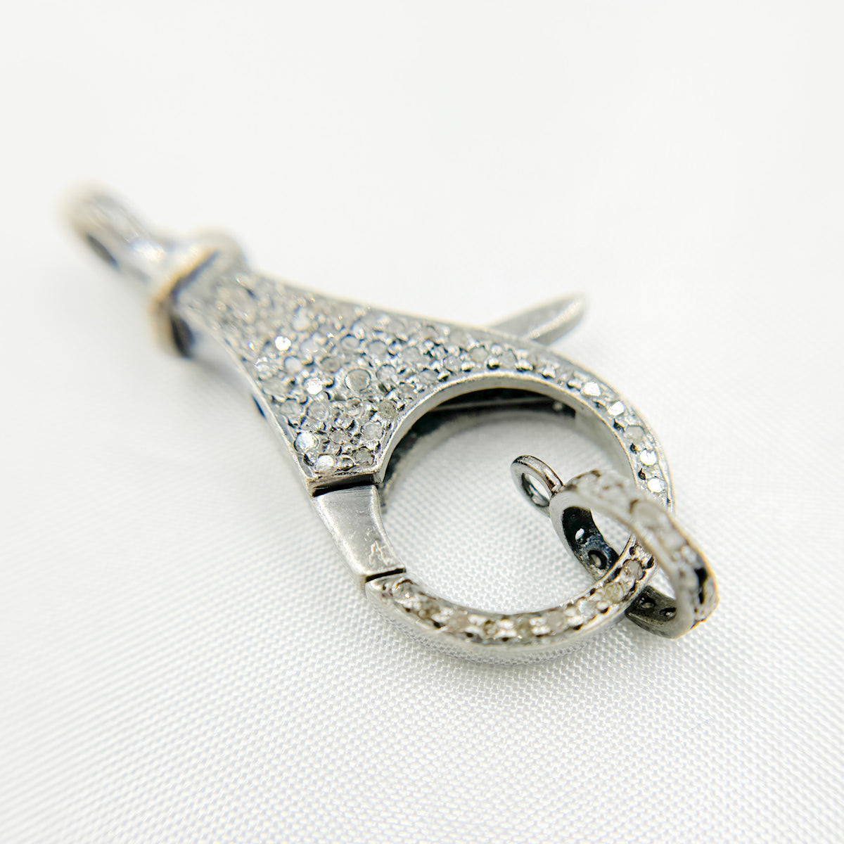 DC646. Diamond & Sterling Silver Round Trigger Clasp.