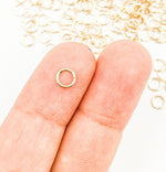 Load image into Gallery viewer, 14K Gold Filled Open Jump Ring 22 Gauge 5mm. 4004452
