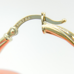 Load image into Gallery viewer, GER173. 14K Gold Hollow Hoop Earrings with Engraved Tornado Design