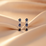 Load image into Gallery viewer, CE97504BS4X3. 14K Solid White Gold Blue Sapphire Oval Hoops