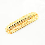 Load image into Gallery viewer, A long oval-shaped connector with a black rhodium finish and gold plating, adorned with pave diamonds on the surface.