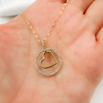 Load image into Gallery viewer, 14K Solid Gold Diamond Circle Charm with Heart in the Center. EJP1496