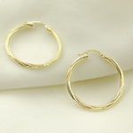 Load image into Gallery viewer, GER173. 14K Gold Hollow Hoop Earrings with Engraved Tornado Design