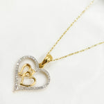 Load image into Gallery viewer, 14K Solid Gold Diamond Heart Charm with Two Hearts in the Center. EJP1489