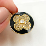 Load image into Gallery viewer, A collection of round flower pendants with gemstone centers, featuring a combination of black, gold, and silver colors, and diamond accents.