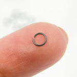 Load image into Gallery viewer, MFT060DE4BR. 4MM 22Gauge Black Rhodium Open Jump Ring