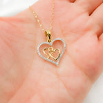 Load image into Gallery viewer, 14K Solid Gold Diamond Heart Charm with Two Hearts in the Center. EJP1489