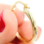 Load image into Gallery viewer, 14K Gold Hoop Earrings with Engraved Tornado Design