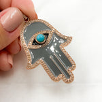 Load image into Gallery viewer, A collection of sterling silver Hamsa pendants with gemstone inlays and black rhodium plating, displayed against a white background.