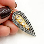 Load image into Gallery viewer, A collection of three long drop pendants with gemstone inlays, featuring a mix of two-tone and gold-plated designs.