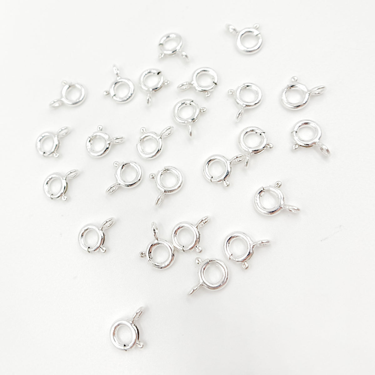 Shop Now 7MM White Sterling Silver Spring Ring Clasp