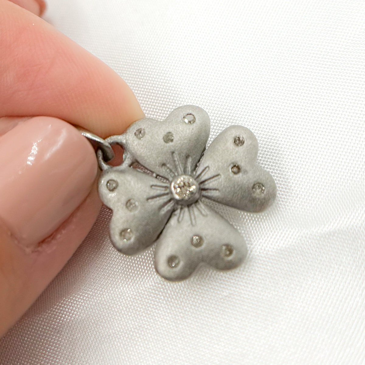 Shop Now Diamond Sterling Silver Flower Pendant
