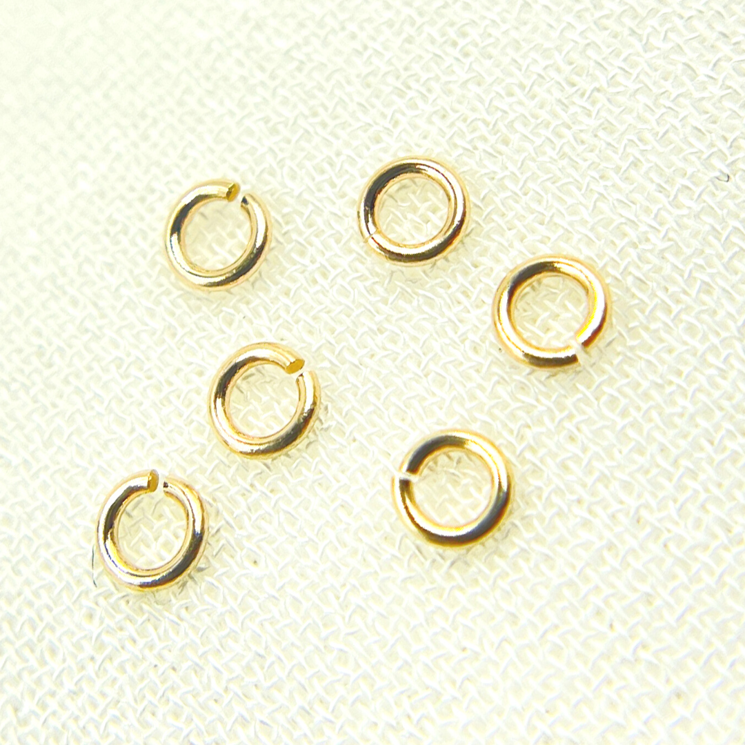 14K Solid Yellow Gold Open Jump Ring Gauge: 24. Size: 3mm. MFT050DE3-14K