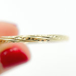 Load image into Gallery viewer, GER173. 14K Gold Hollow Hoop Earrings with Engraved Tornado Design