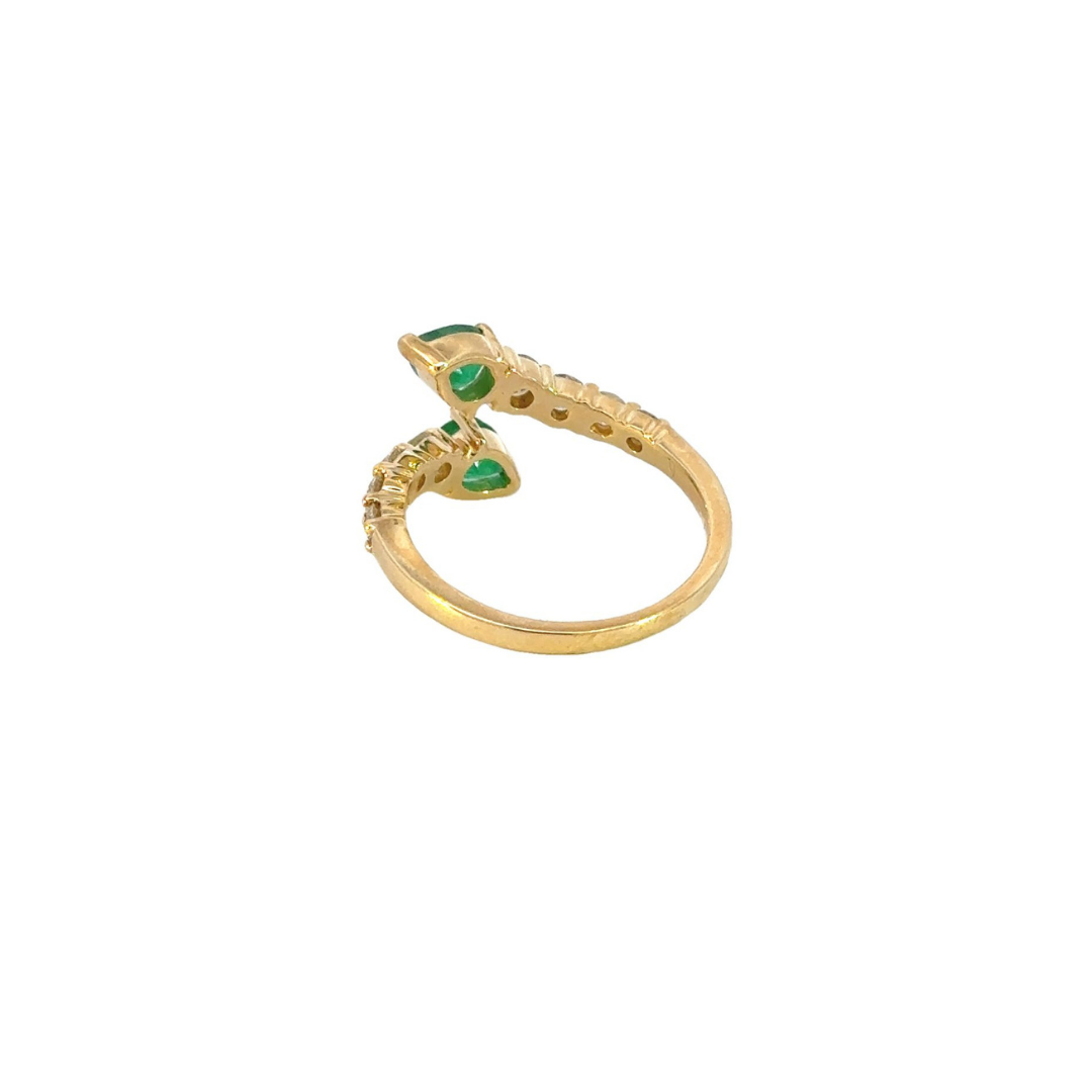 14k Solid Gold Spiral Diamond and Emerald Ring. RFM17697