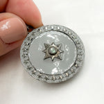 Load image into Gallery viewer, A collection of sterling silver round enamel pendants with gemstone centers
