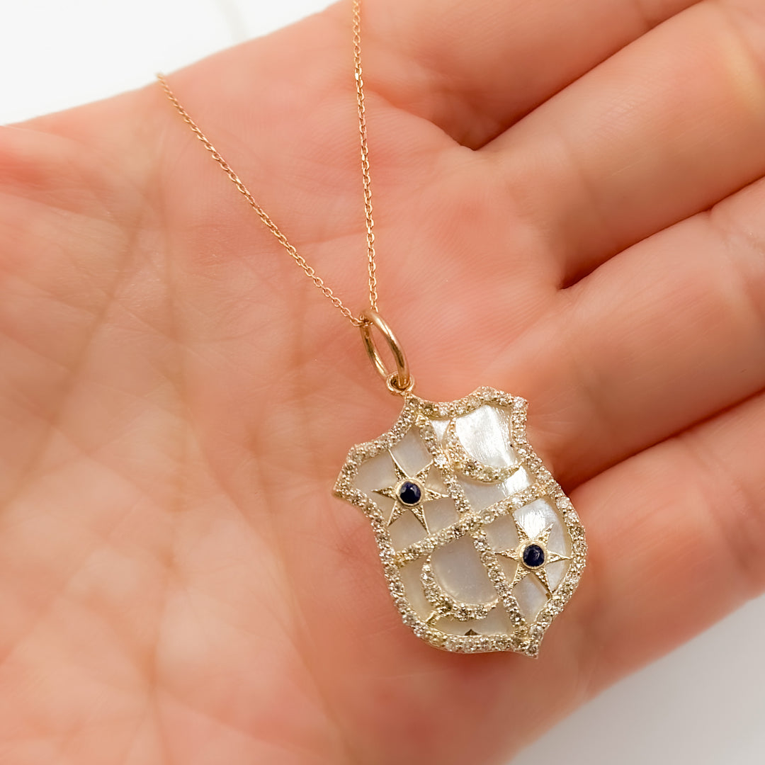 Shop Now  Gold Shield Pendant