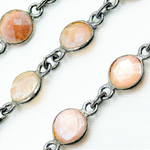 Load image into Gallery viewer, Coated Peach Moonstone Round Shape Bezel Oxidized Wire Chain. CMS17