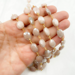 Load image into Gallery viewer, Coated Peach Oval Moonstone Gold Plated Wire Chain. CMS77