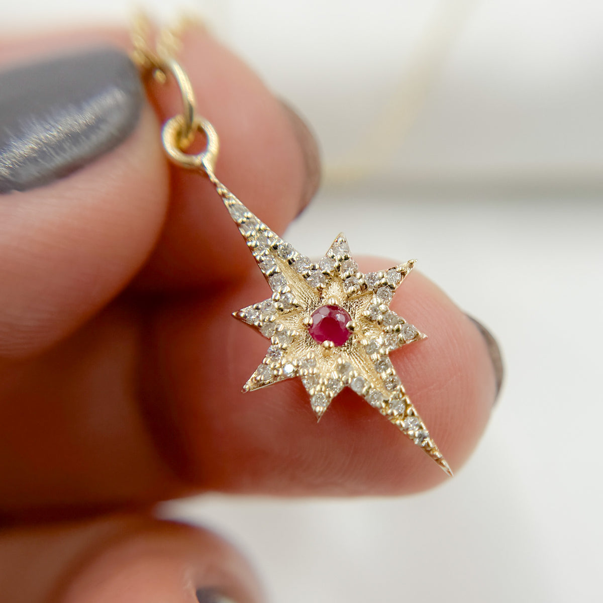 GDP186. 14k Solid Gold Diamond and Ruby Star Charm