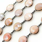Load image into Gallery viewer, Coated Peach Moonstone Round Shape Bezel Oxidized Wire Chain. CMS111