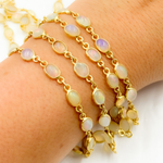 Load image into Gallery viewer, Ethiopian Opal Oval Shape Bezel Gold Plated Wire Chain.