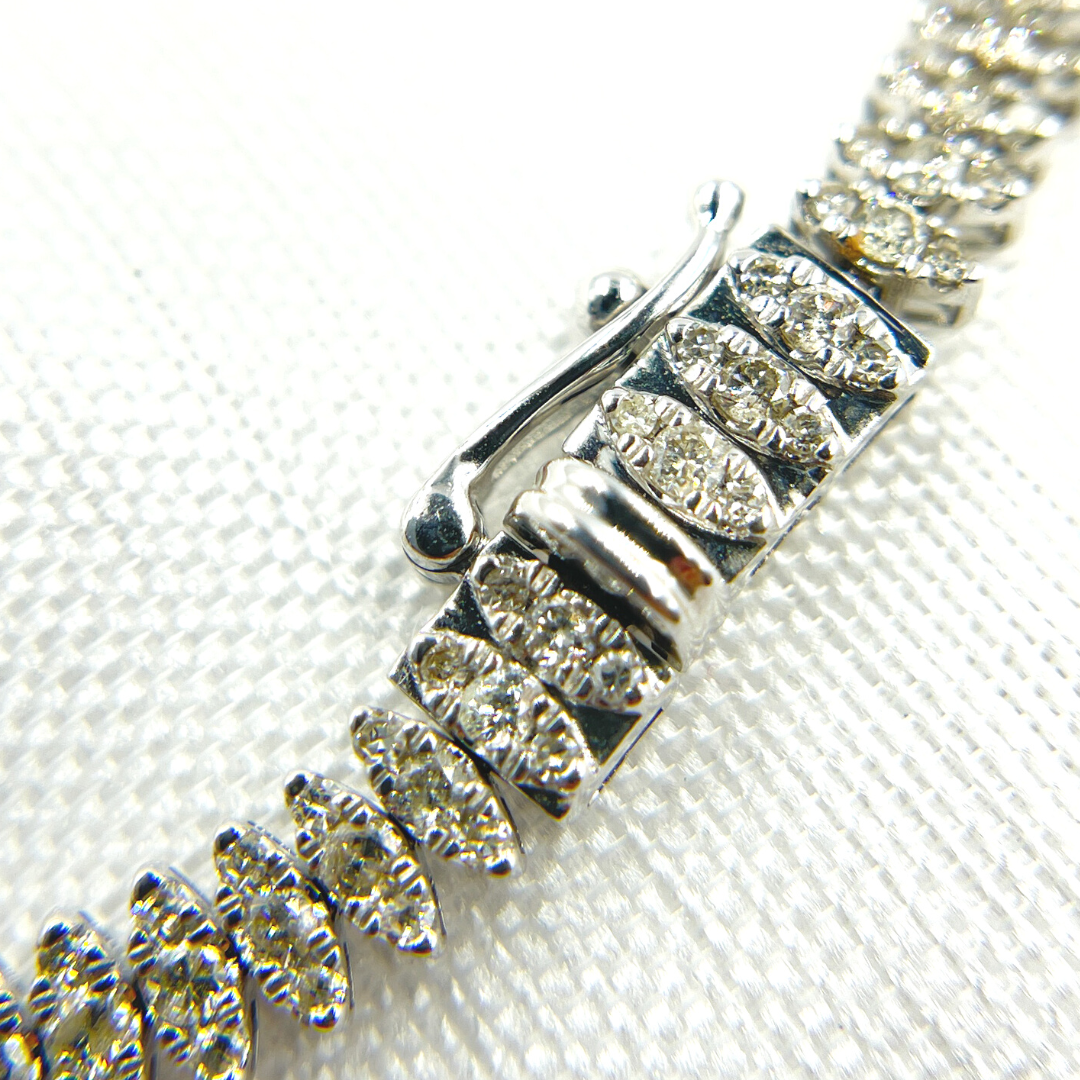 RSOJBR7043WG. 14K White Gold Bracelet with Diamond Leaves