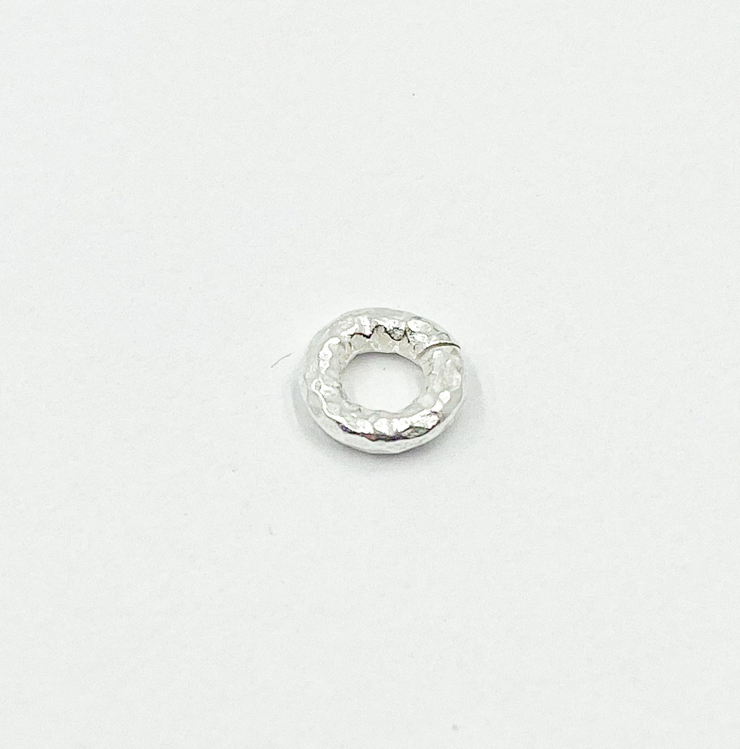 HJR8SS. Sterling Silver 8mm Hammered Open Jump Ring