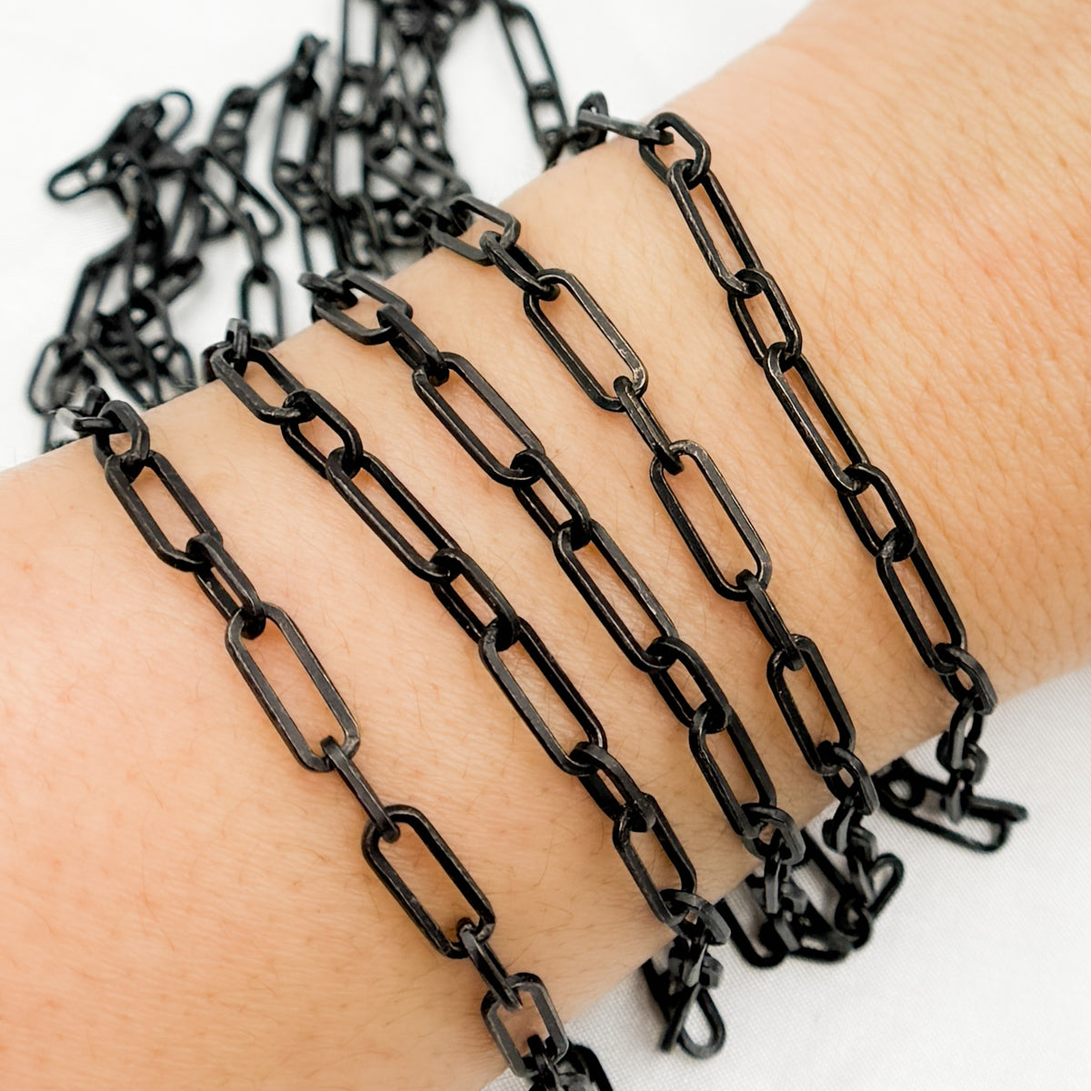V149BRM. Black Rhodium Matt Sterling Silver Flat Paperclip Long and Short Chain
