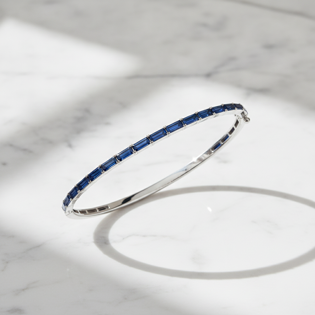 BNZ68665. 14K Solid White Gold Bangle with Blue Sapphire Baguette Stones