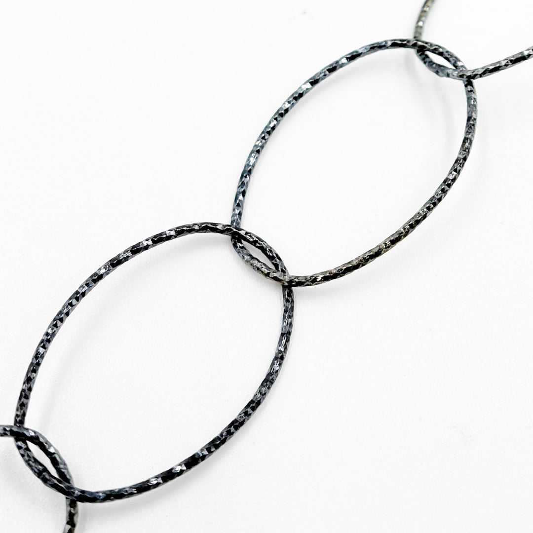 Y26BR. Sterling Silver Black Rhodium Diamond Cut Oval