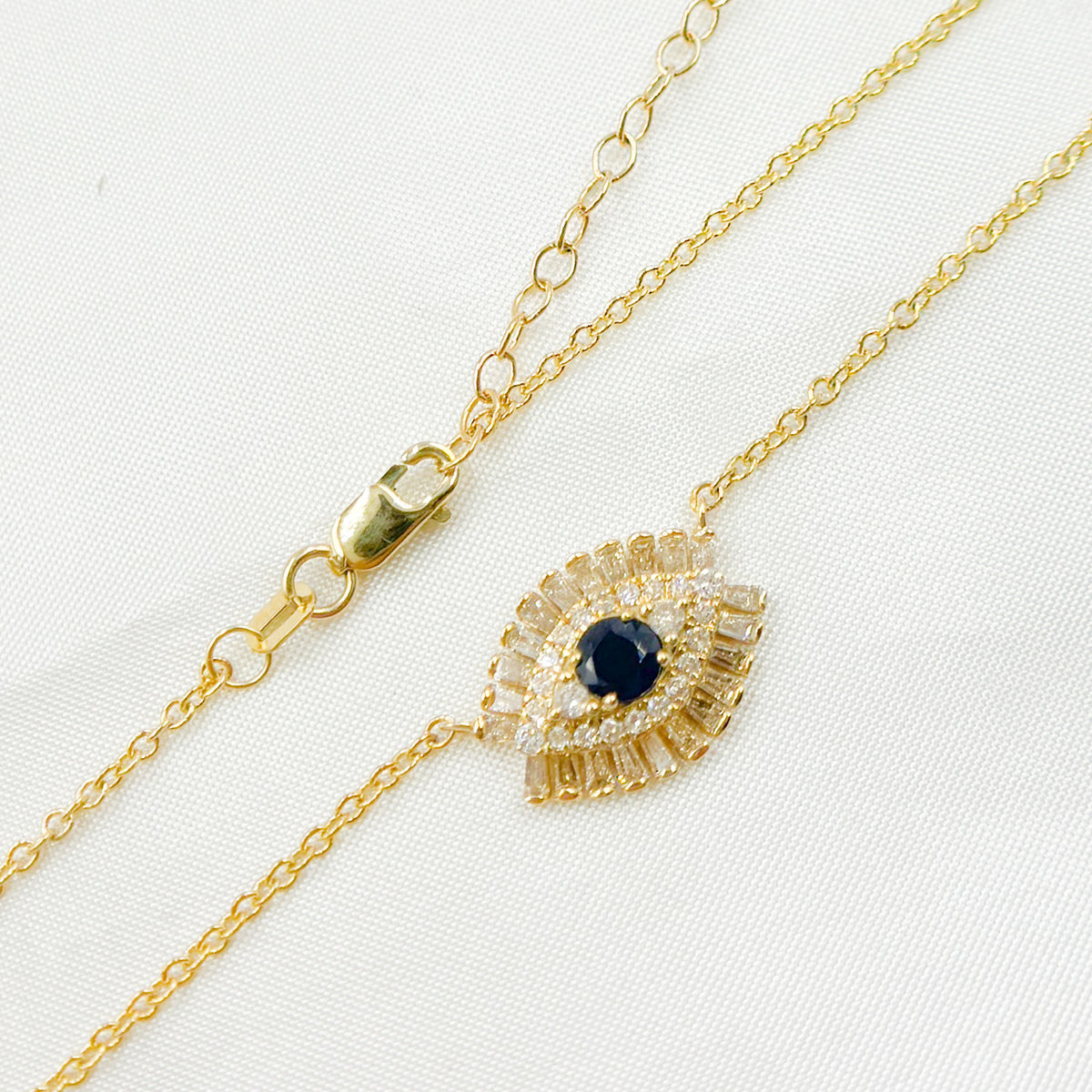 NFH71188BS. 14k Solid Gold Blue Sapphire and Diamond Eye Necklace