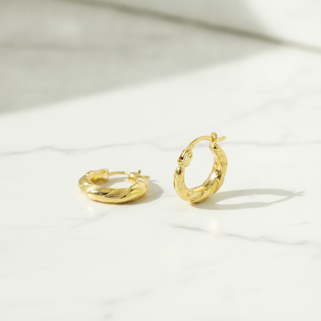 GER134. 14K Gold Twisted Hollow Hoop Earrings