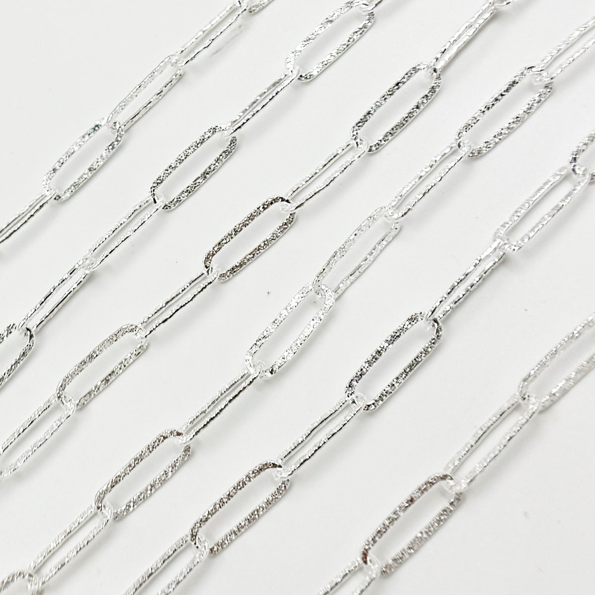Y80FDCSS. Sterling Silver Flat Textured Paperclip Chain