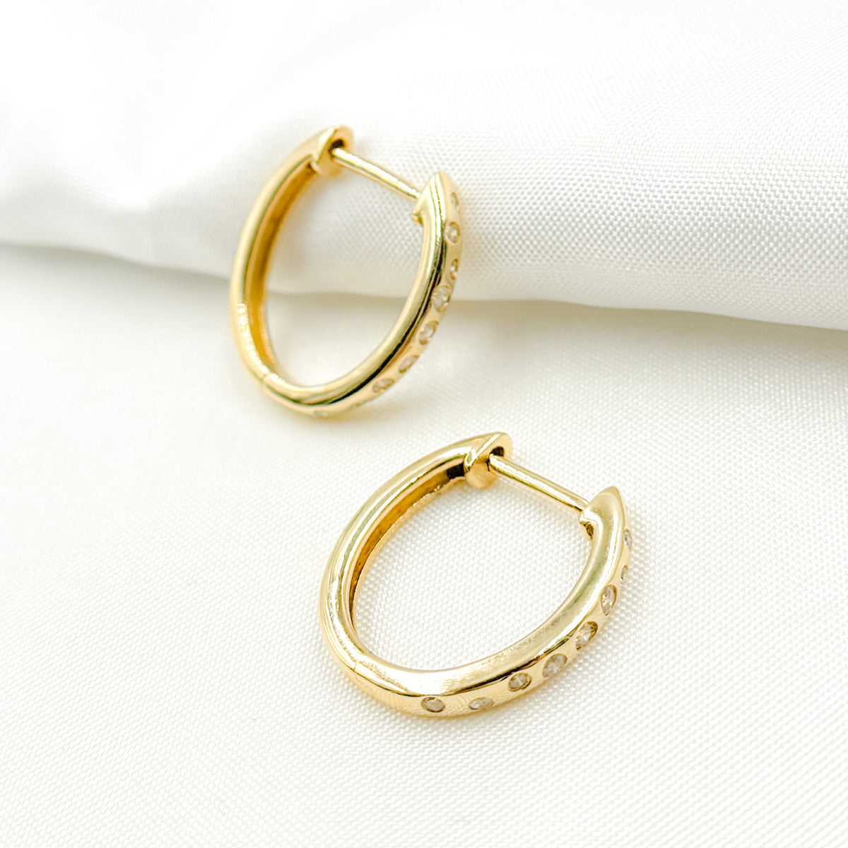 EHC56536. 14K Solid Gold Diamond Oval Hoops
