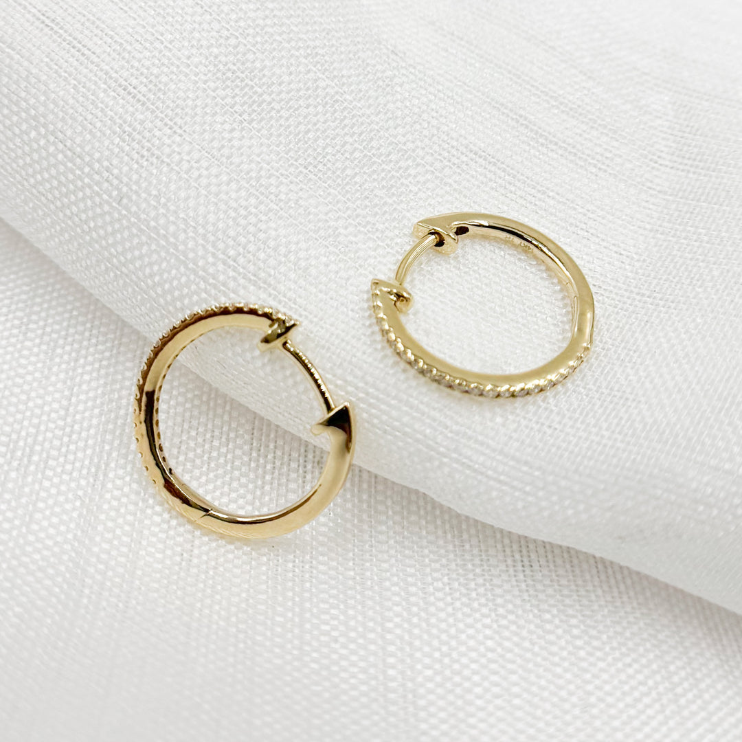 HP115374. 14K Solid Gold Diamond Huggies