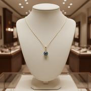 CMF00358B. 14K Solid Gold Blue Natural Diamond Round Charm