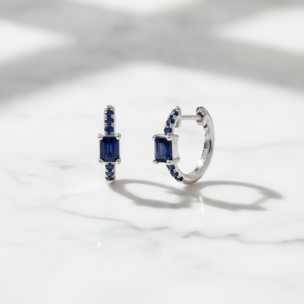 EHZ56727BS. 14K Solid White Gold Blue Sapphire Huggies