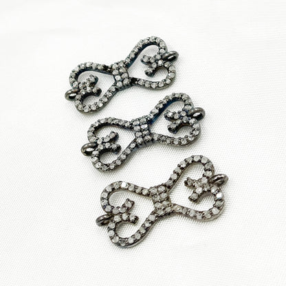DC187. Diamond & Sterling Silver Bow Connector