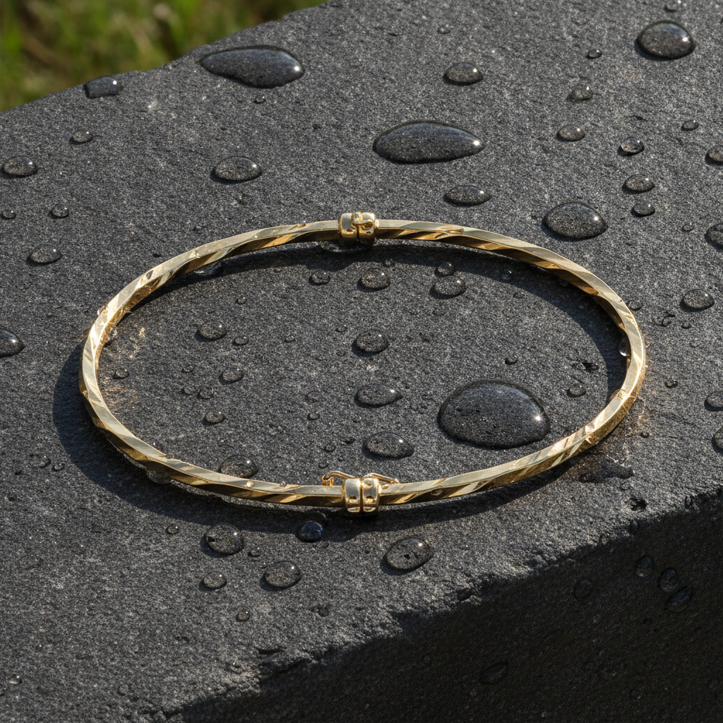 Bangle6. 14K Gold Twisted Hollow Bangle Bracelet