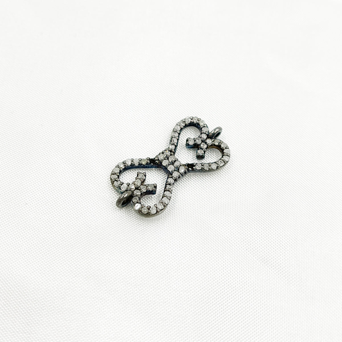 DC187. Diamond & Sterling Silver Bow Connector