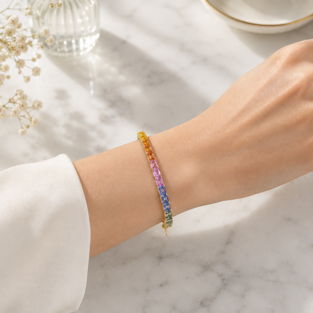 CB97290. 14K Solid Yellow Gold Bangle with Multi Sapphire Baguette Stones