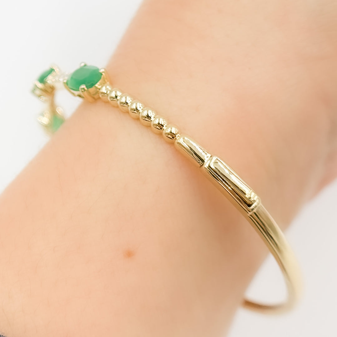 BNF68583EM. 14k Solid Gold Diamond and Emerald Bangle