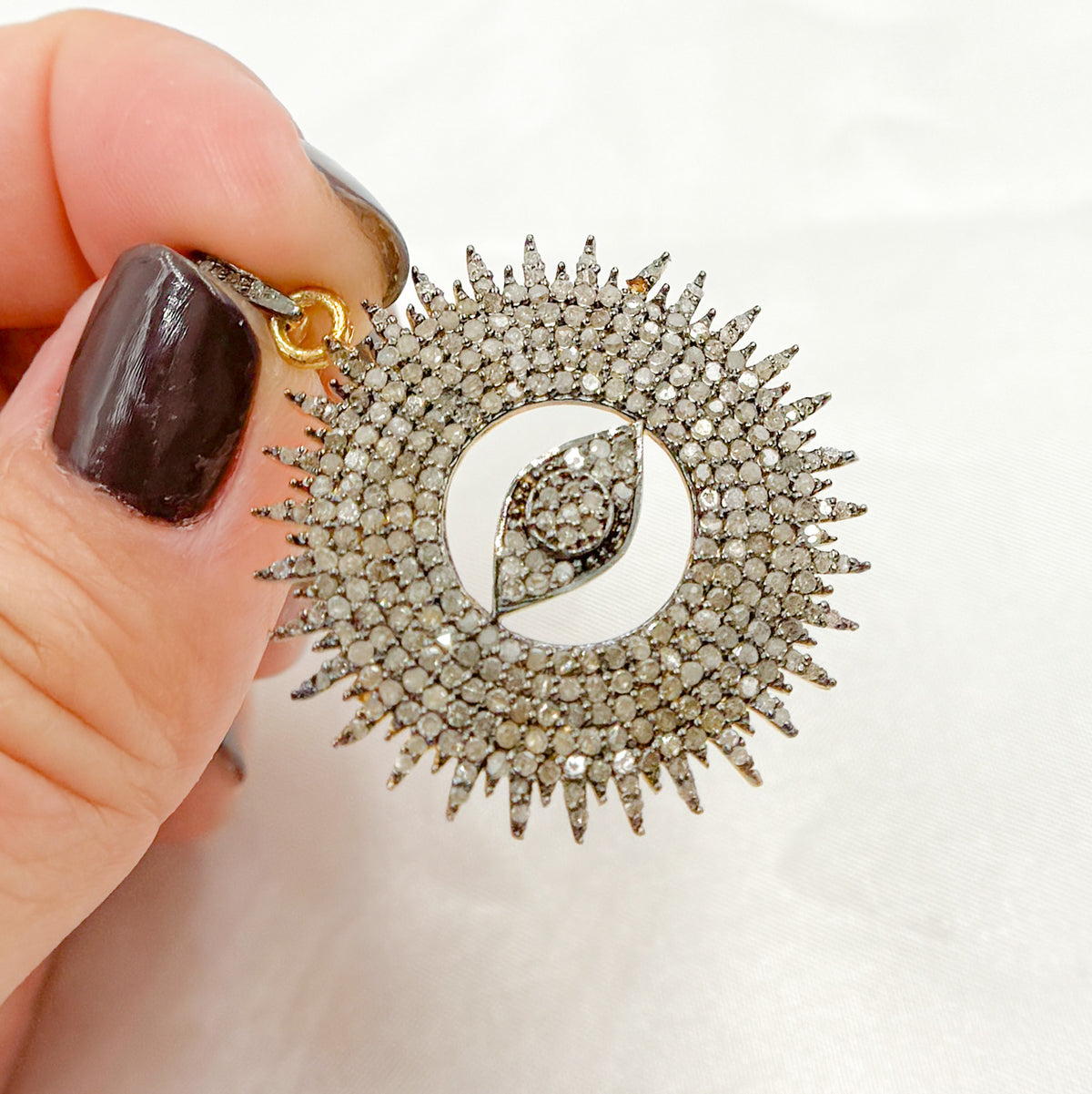 DC1013. Diamond Sterling Silver Round Eye Pendant