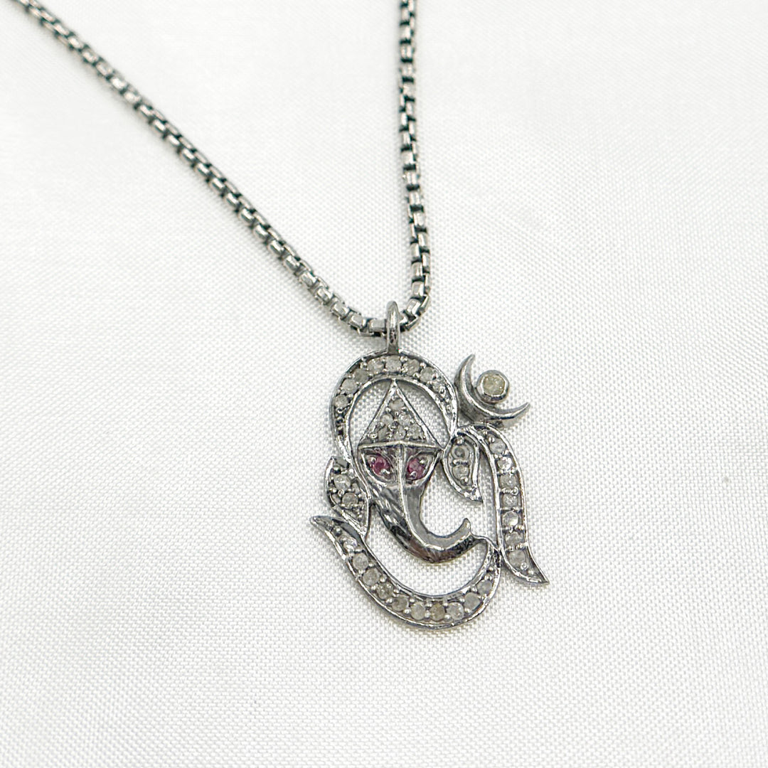 DC1014. Diamond Sterling Silver OM Symbol Pendant with Ruby