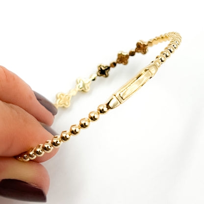 BNL68567. 14K Solid Yellow Gold Diamond and Gemstone Bangle