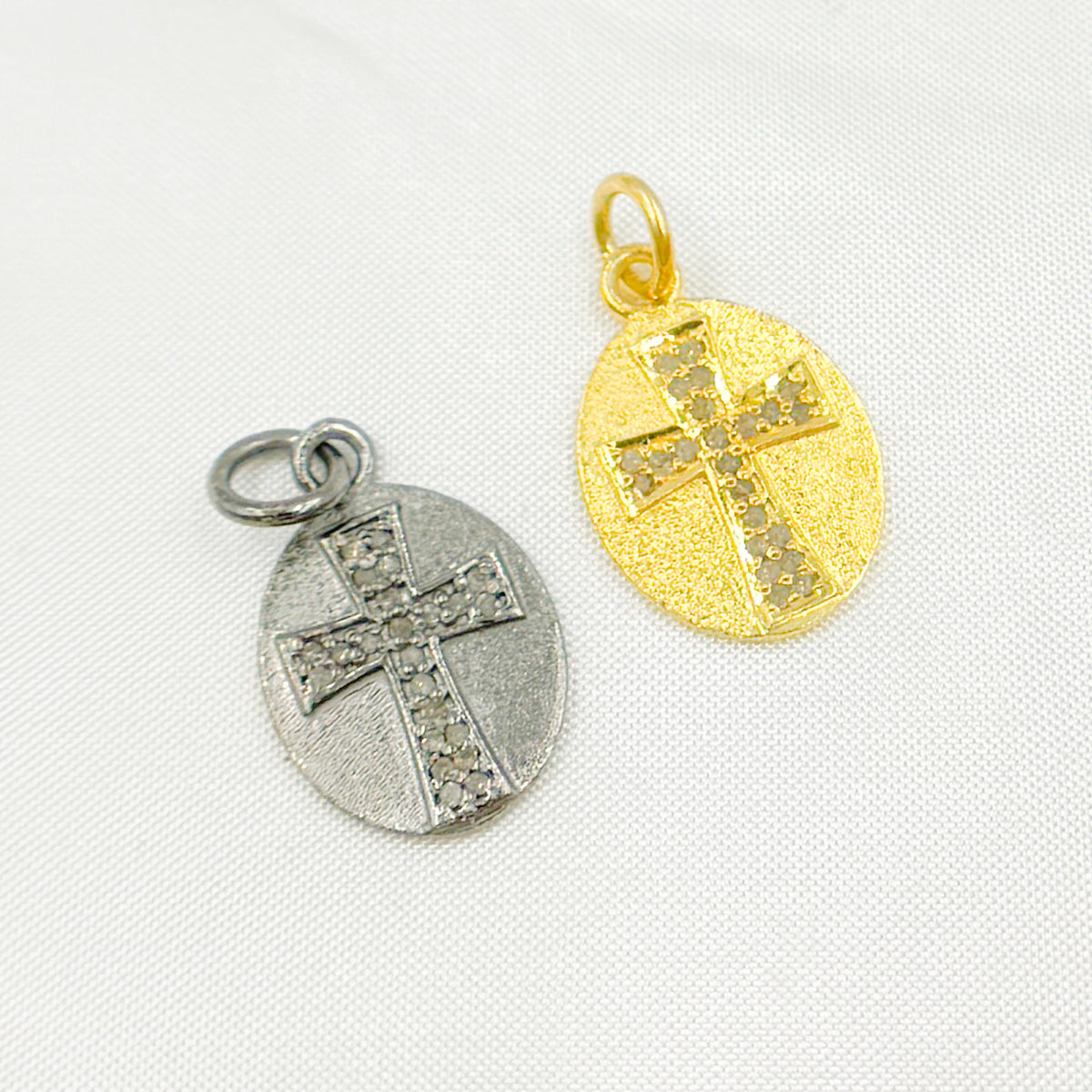 DC305. Diamond Sterling Silver Oval Cross Charm