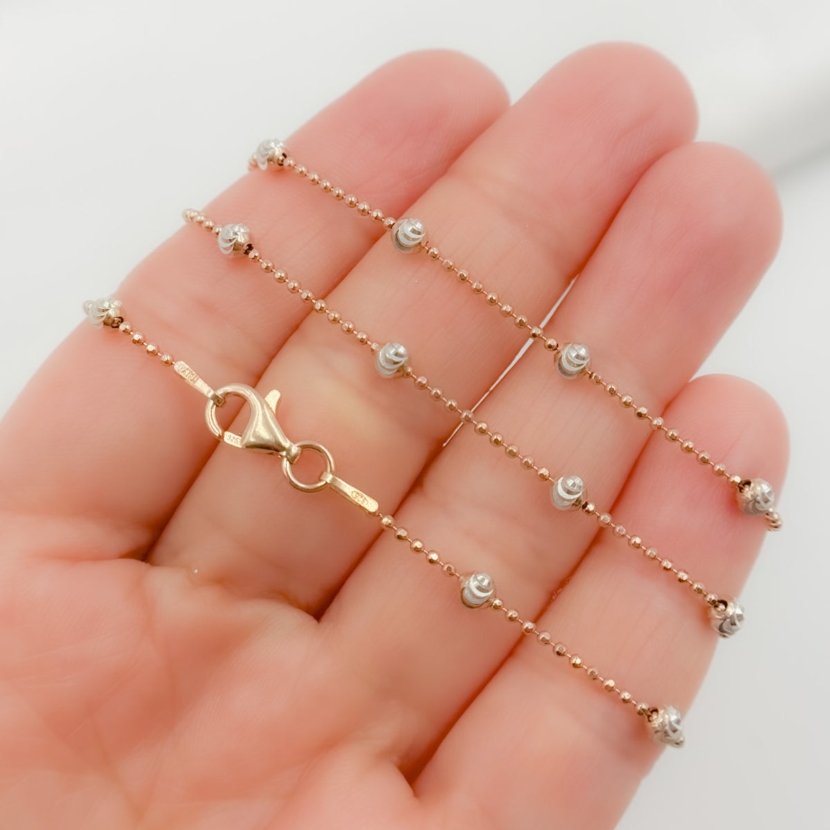 STRM003RW. Rose Gold Plated and White Sterling Silver Satellite Necklace